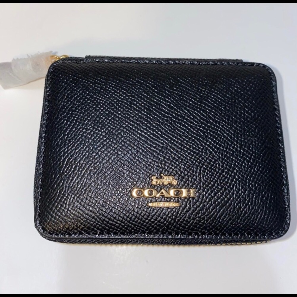 Coach leather weekly pill box